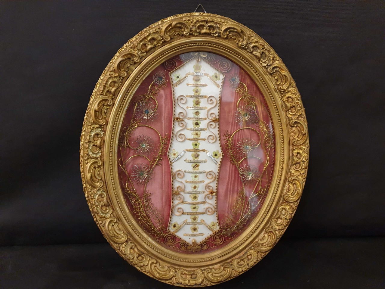 Cornice dorata con reliquie - Antichità Ioviero